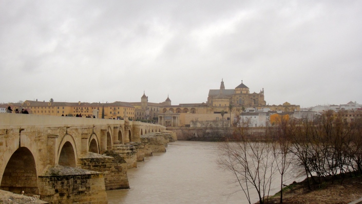 Roman bridge over the Río Guadalquivir, built in 1st century BC, with the historic center of Córdoba in the background.