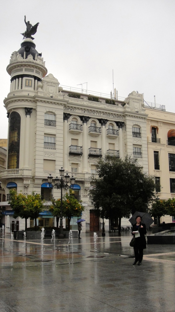 Me with my trusty umbrella at the Plaza de las Tendillas, home of some beautiful 1920s-era buildings.